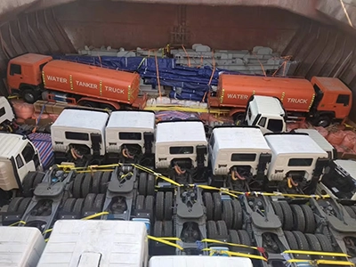 A group of kales trucks parked at the port, waiting for export.